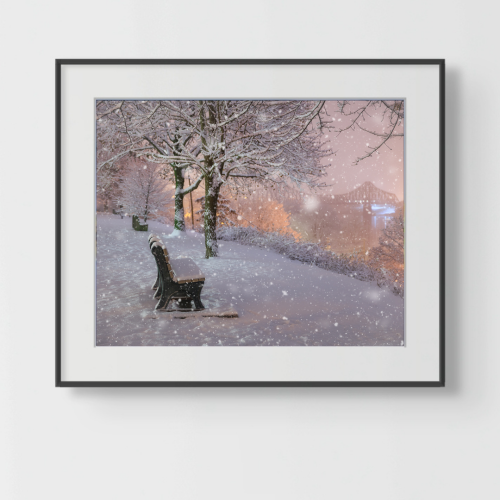 Snow falling on river road-premium-frame
