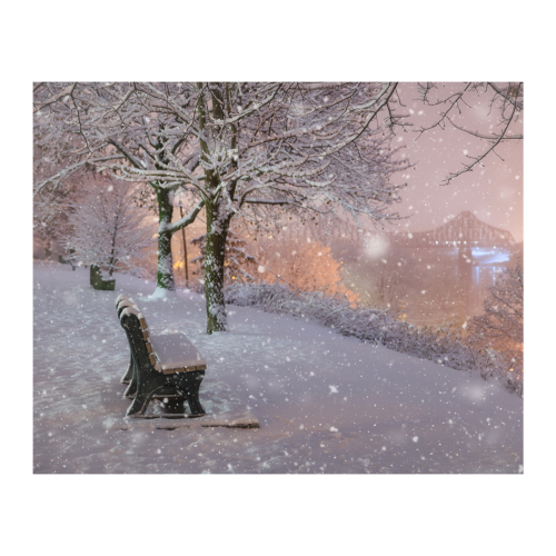 Snow falling on river road